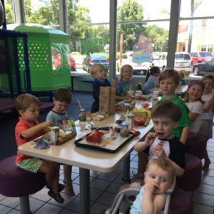 children sitting at a table