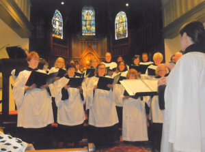 Choir singing in front of church